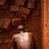 A brick maker works in the quarry
