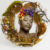 African American woman surrounded by wreath of flowers