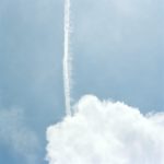 Amanda Boe's cloud in the sky with an upward contrail.