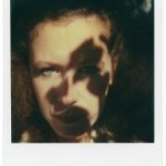 Woman with shadow on her face