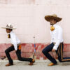 Man and boy dressed in Mexican outfits