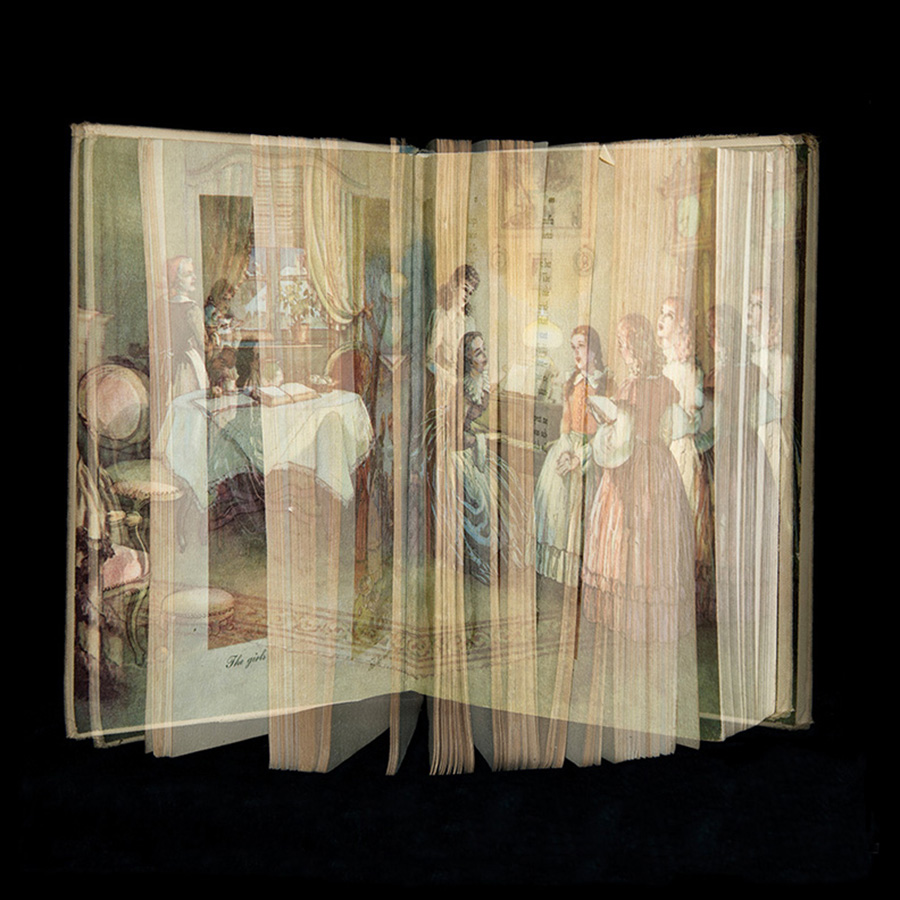Book with image projected on it