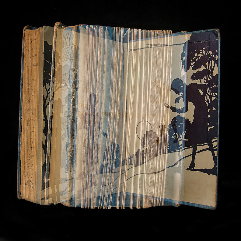 Book with image projected on it