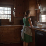 Woman at the kitchen sink