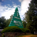Motel sign as a tree