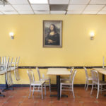 Dining area with picture of Mona Lisa