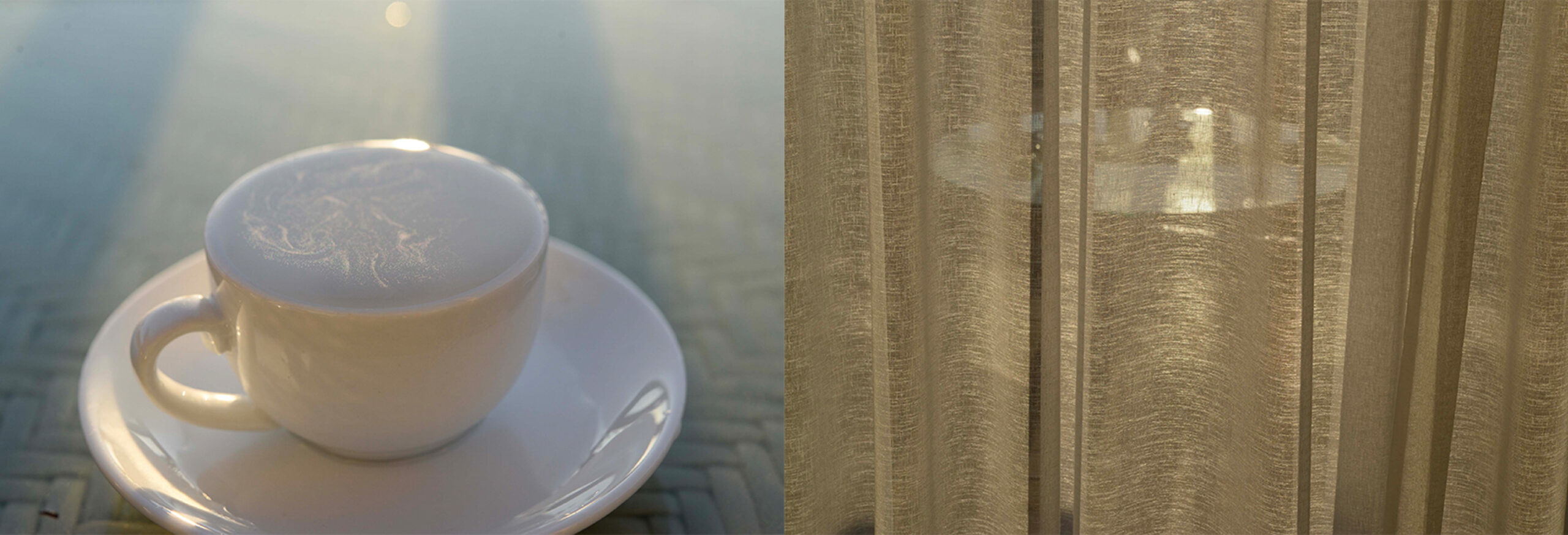 White cup next to brown curtain