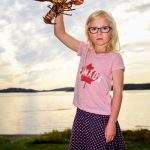 Girl holding lobster