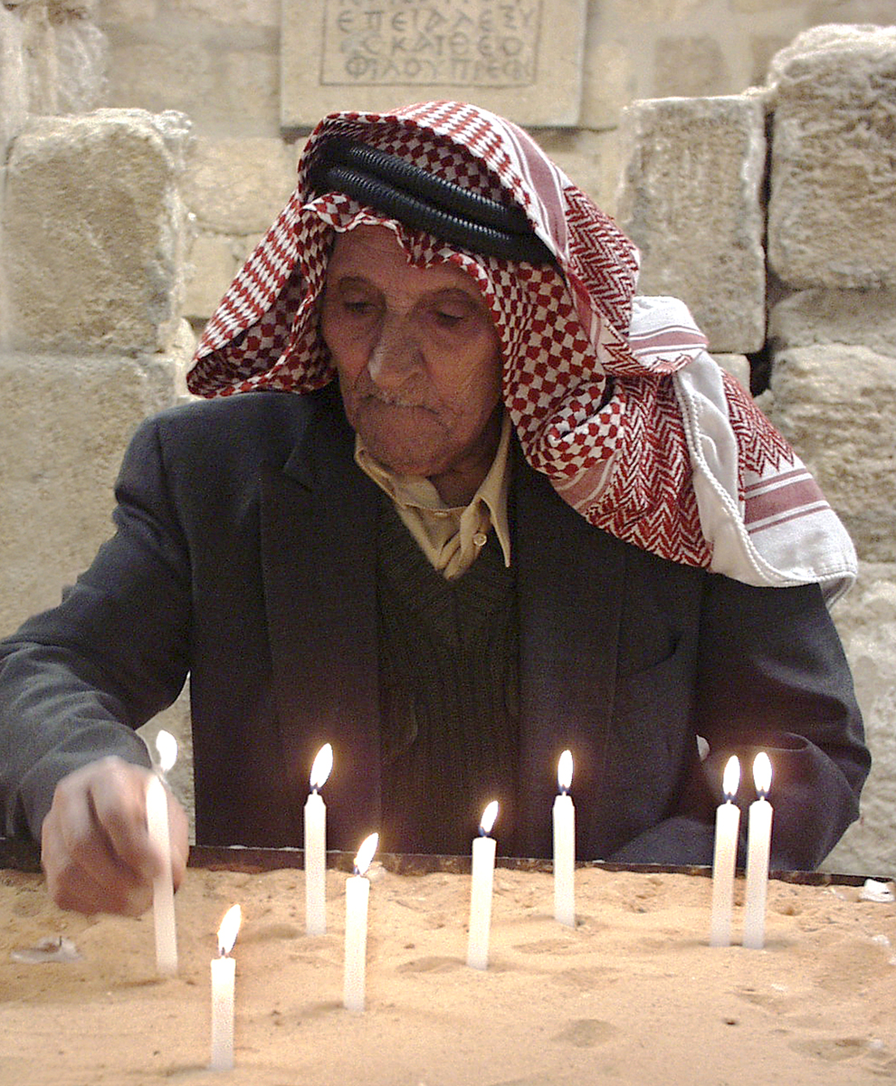 Man lighting candles