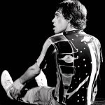 Mick Jagger sitting