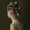 Girl with hair in curlers