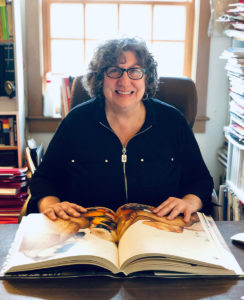 Paula at her desk. 