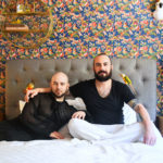 2 men on a bed