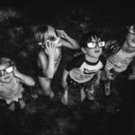 Four Children Looking at a Solar Eclipse
