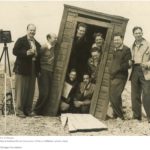 Group of people posing with camera