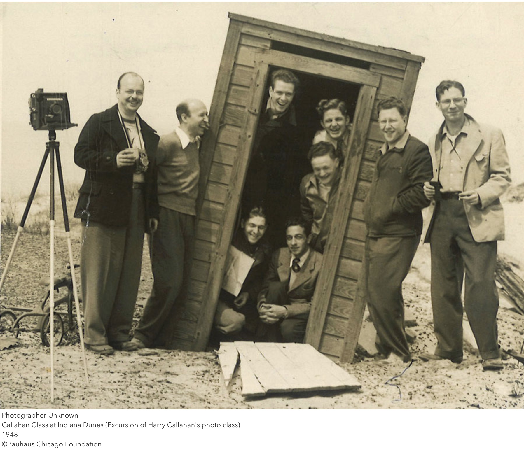 Group of people posing with camera