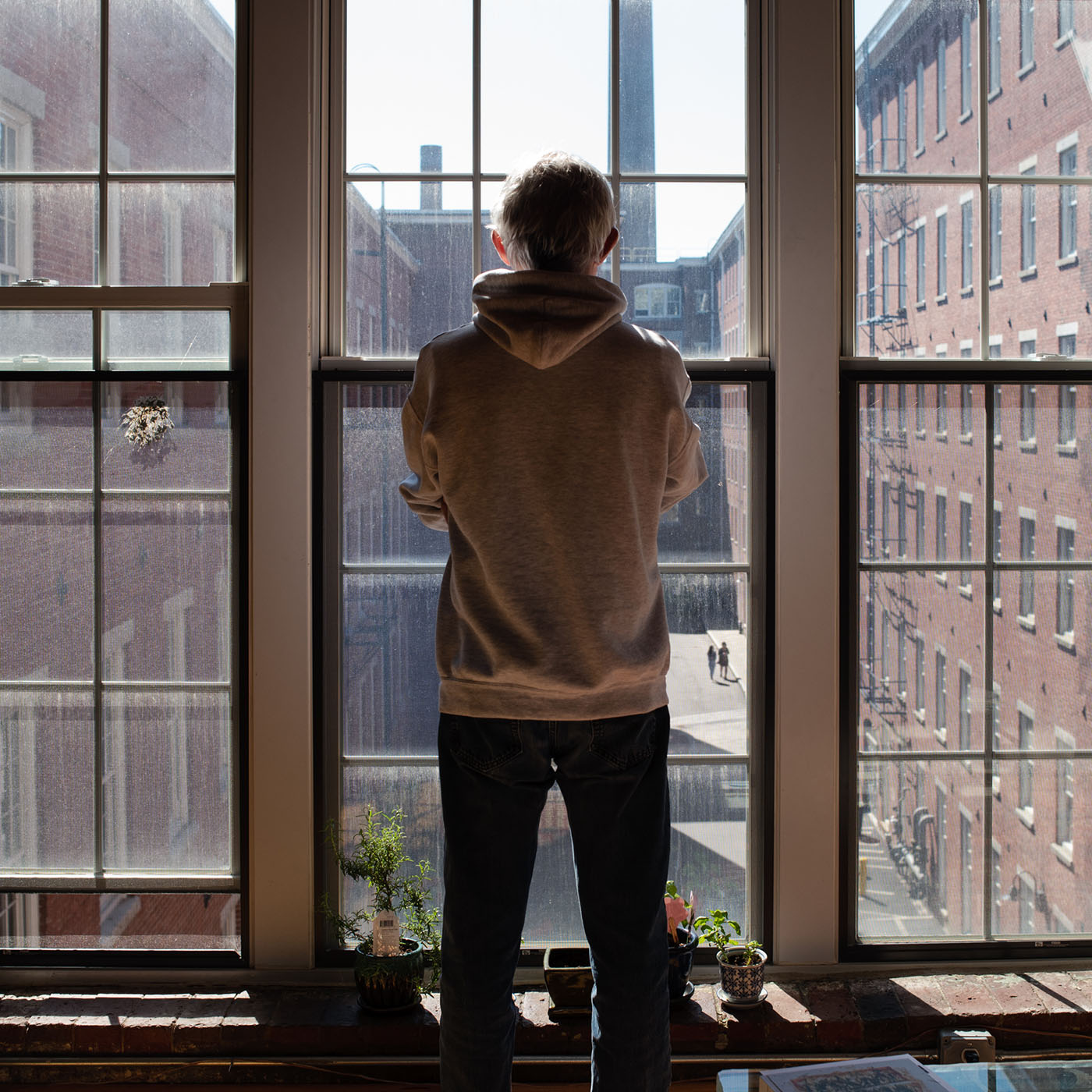 person at window