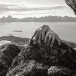 hand on rock