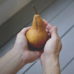 pear in hand