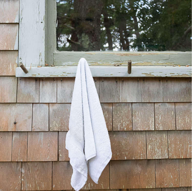 white towel hanging outside