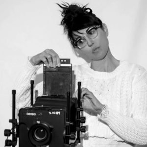 portrait of Donna Garcia with camera