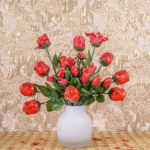 vase of red flowers