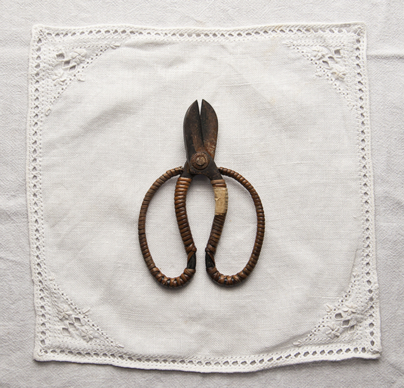 scissors on a doily