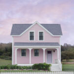 Pink house with picket fence