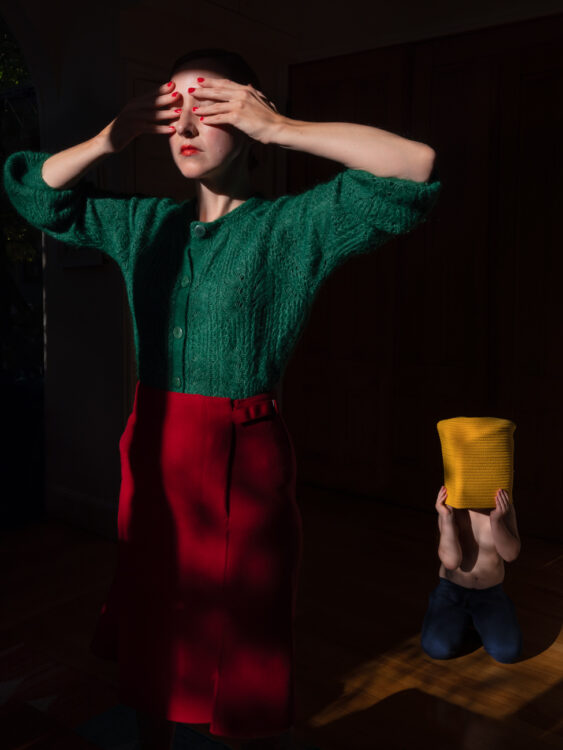 girl covering her eyes